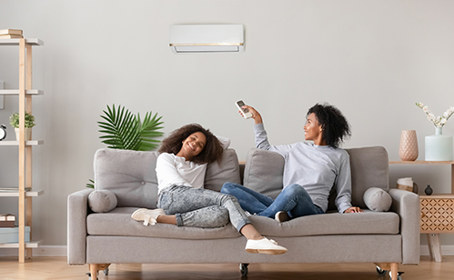 mother and daughter enjoying the comfort of HVAC system