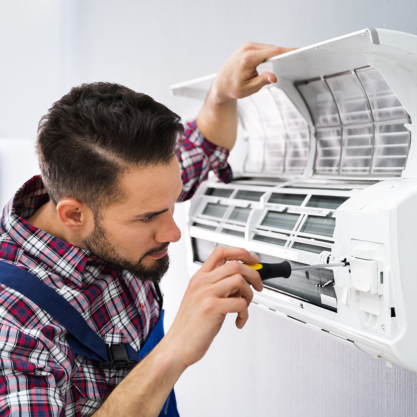 Man installing HVAC system